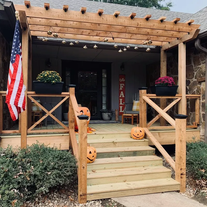 Front porch with new wooden pergola, railings, and steps, C&A Roofing & Construction
