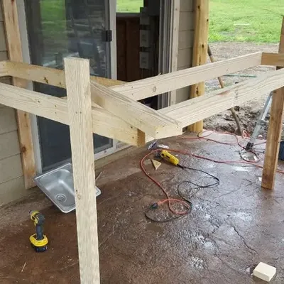 Framing for outdoor bar counter on patio, C&A Roofing & Construction
