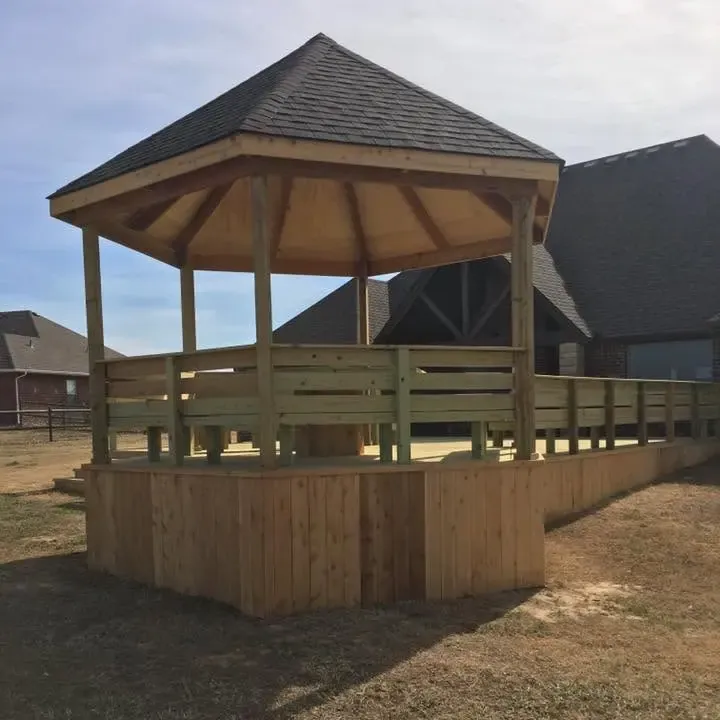 Wooden gazebo with shingle roof on raised deck, C&A Roofing & Construction
