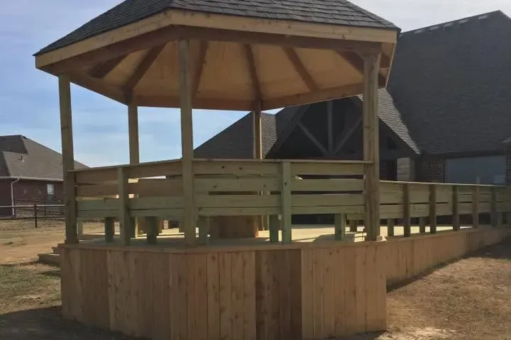 Wooden gazebo with shingle roof on raised deck, C&A Roofing & Construction