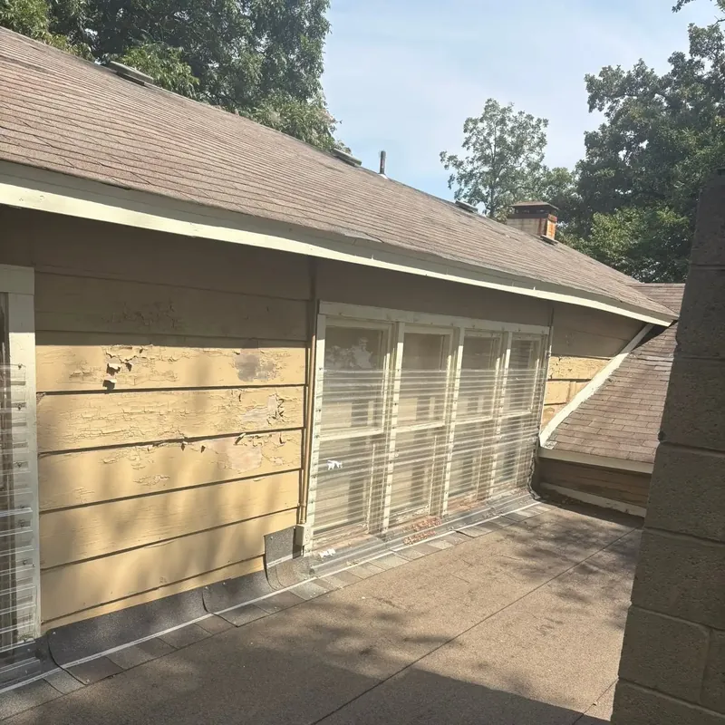House siding with peeling, weathered paint, C&A Roofing & Construction