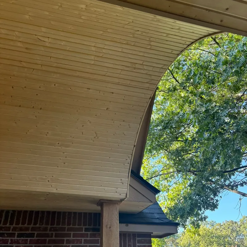 Curved tongue-and-groove wood porch soffit ceiling, C&A Roofing & Construction