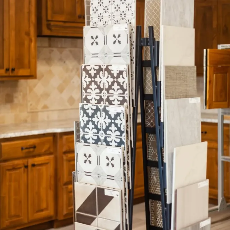Tile sample rack in front of kitchen cabinets, C&A Roofing & Construction