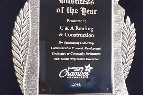 Business of the Year award plaque from Chamber, C&A Roofing & Construction