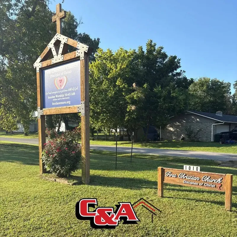 Church sign on lawn with new sign posts, C&A Roofing & Construction