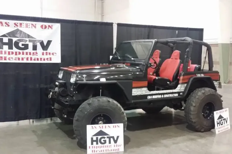 Customized Jeep at HGTV event booth display, C&A Roofing & Construction