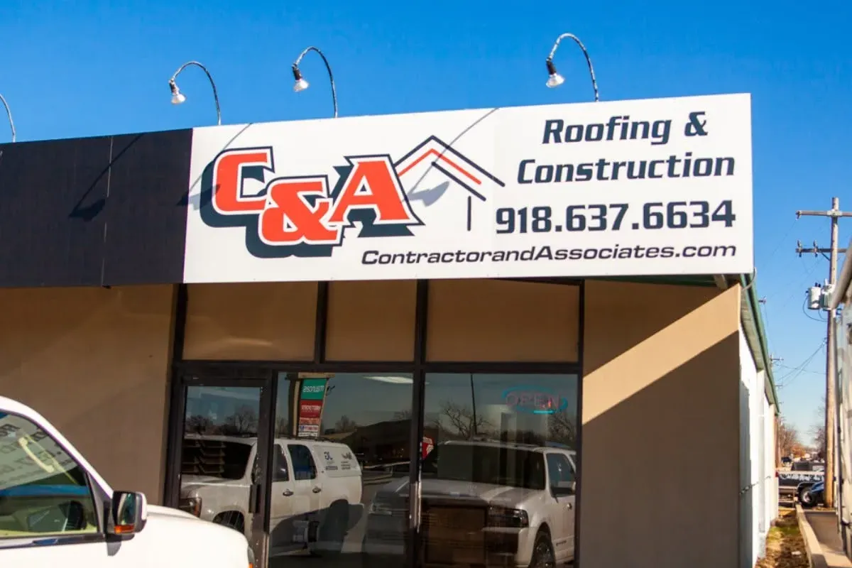 C&A office front with large Roofing & Construction sign, C&A Roofing & Construction
