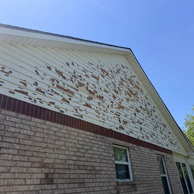 Brick house gable siding with heavy peeling paint, C&A Roofing & Construction