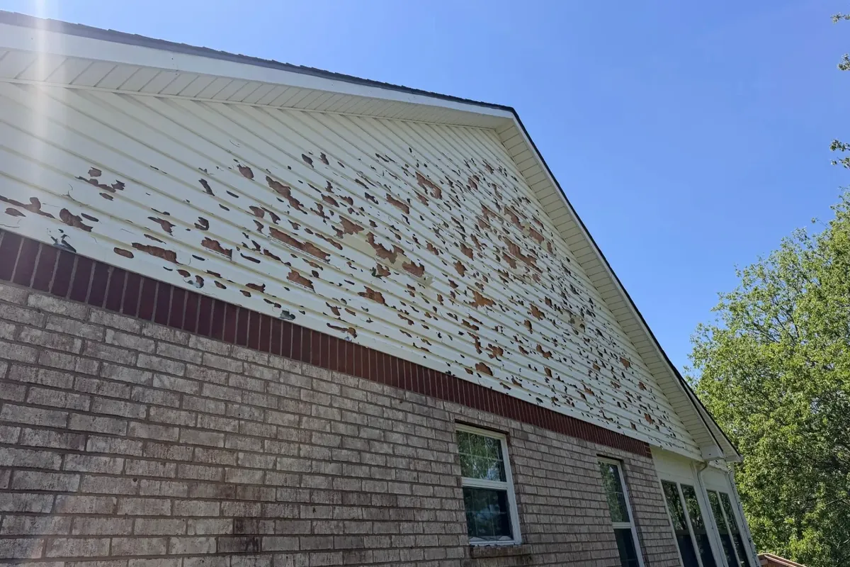 Brick house gable siding with heavy peeling paint, C&A Roofing & Construction