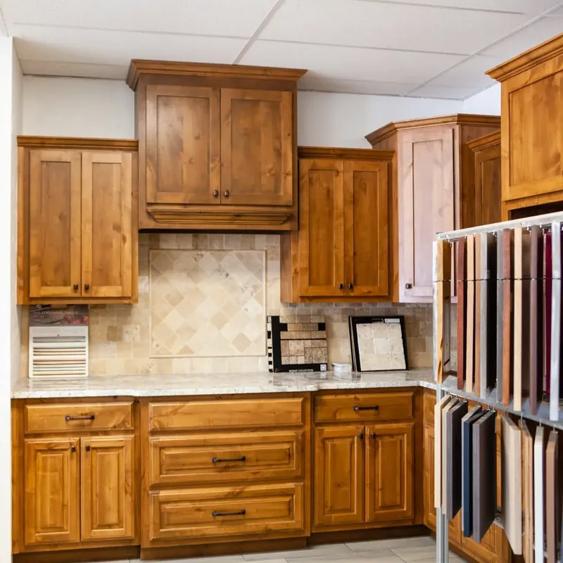 Knotty alder kitchen cabinets and countertop showroom display, C&A Roofing & Construction