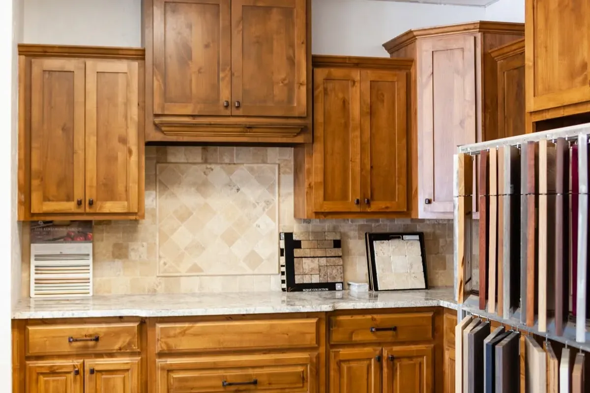 Knotty alder kitchen cabinets and countertop showroom display, C&A Roofing & Construction