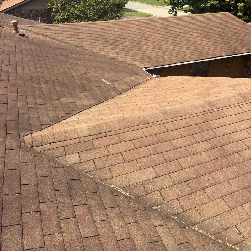 Brown asphalt shingle roof planes viewed from rooftop, C&A Roofing & Construction