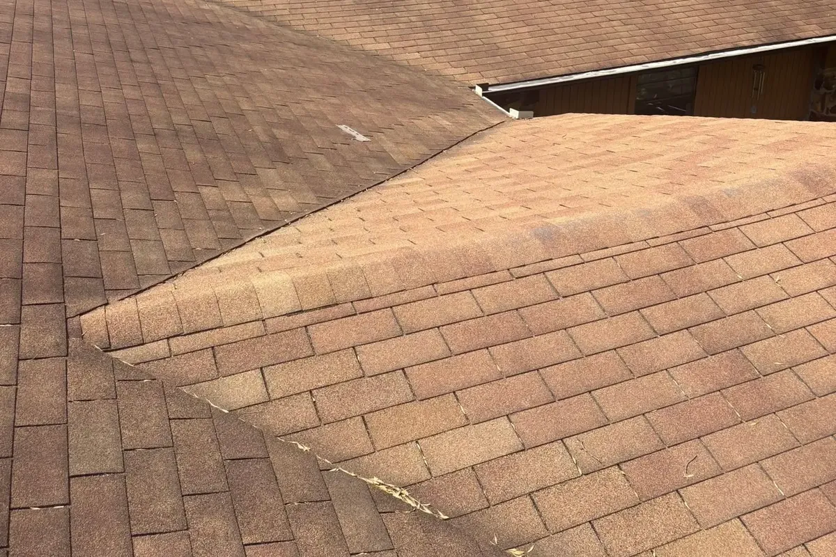 Brown asphalt shingle roof planes viewed from rooftop, C&A Roofing & Construction