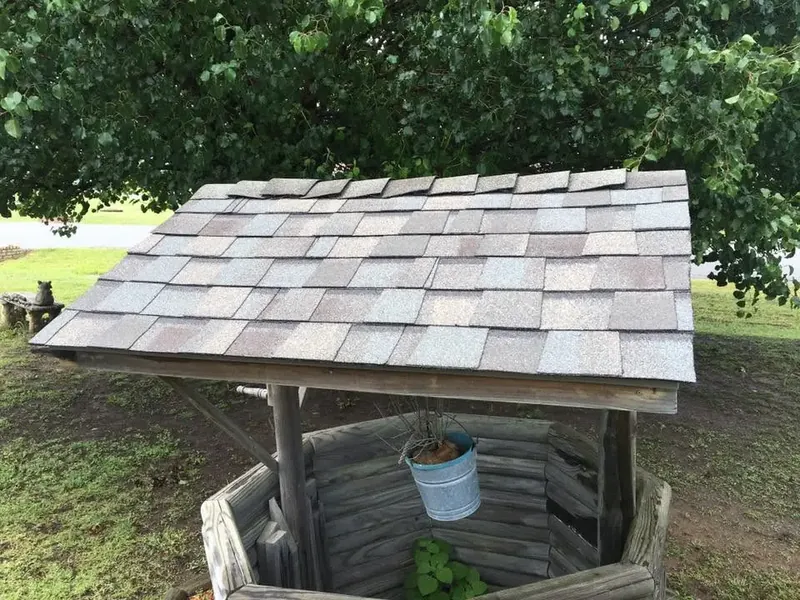 Backyard wishing well with shingle roof, C&A Roofing & Construction