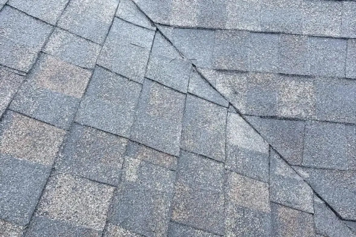 Close-up of gray shingles meeting at valley, C&A Roofing & Construction
