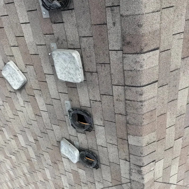 Asphalt shingle roof with several damaged box vents, C&A Roofing & Construction