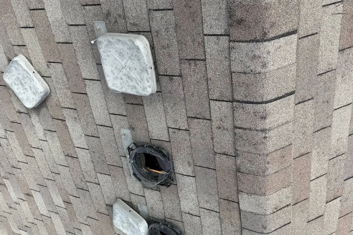 Asphalt shingle roof with several damaged box vents, C&A Roofing & Construction