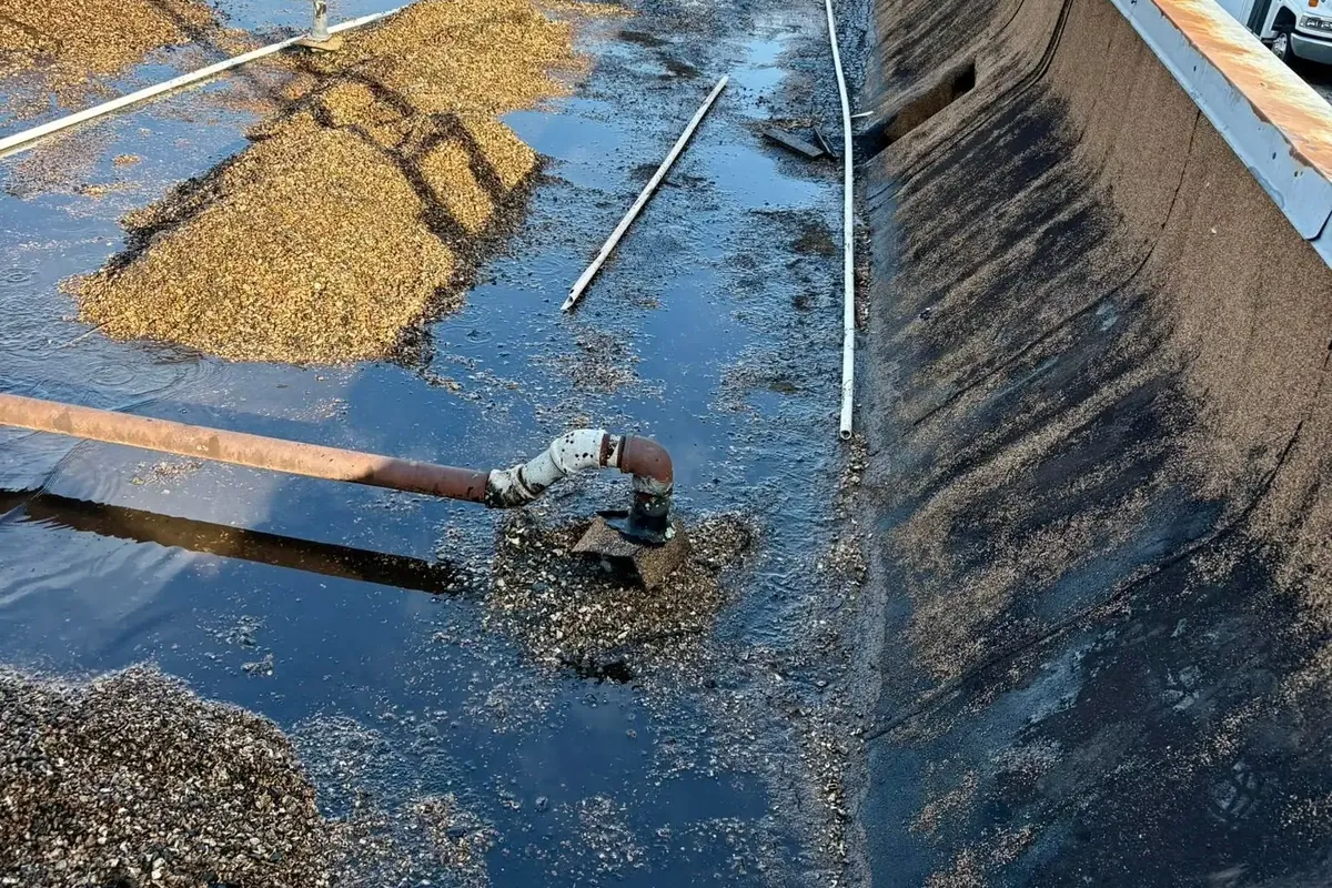 Gravel commercial flat roof with standing water, C&A Roofing & Construction