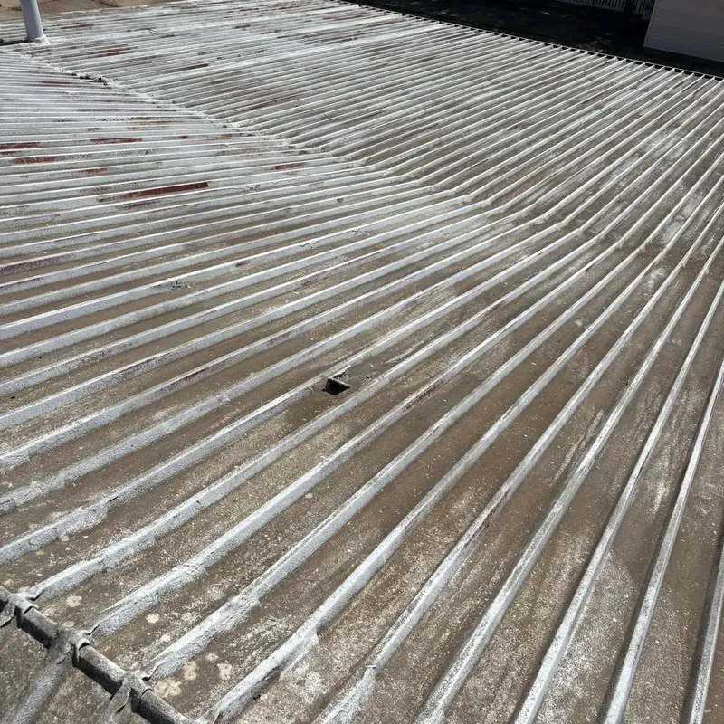 Old worn galvanized metal roof panels closeup, C&A Roofing & Construction