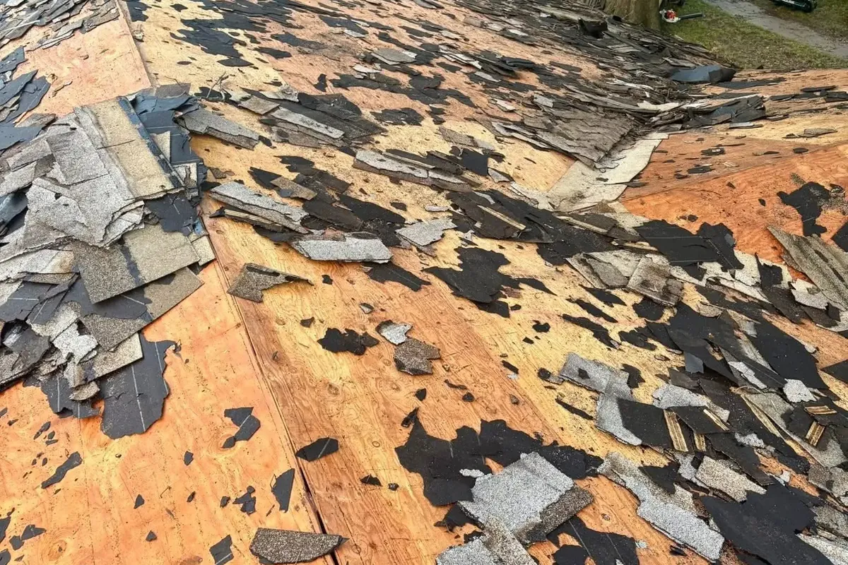 Shingle tear-off exposing plywood decking, C&A Roofing & Construction