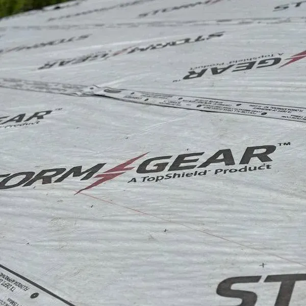 StormGear synthetic underlayment rolled out on roof, C&A Roofing & Construction