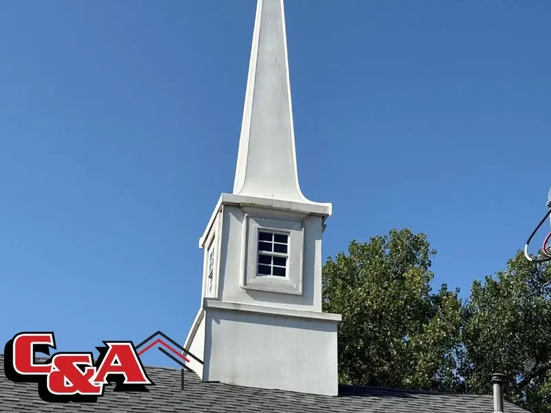 White church steeple rising from shingle roof, C&A Roofing & Construction