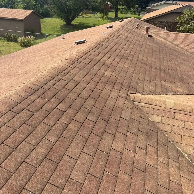 Brown asphalt shingle roof slope before replacement, C&A Roofing & Construction