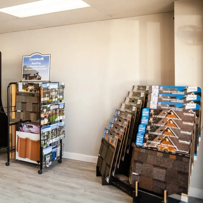 Showroom racks of shingle sample boards, C&A Roofing & Construction
