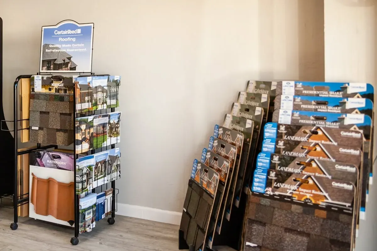Showroom racks of shingle sample boards, C&A Roofing & Construction