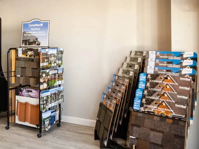 Showroom racks of shingle sample boards, C&A Roofing & Construction