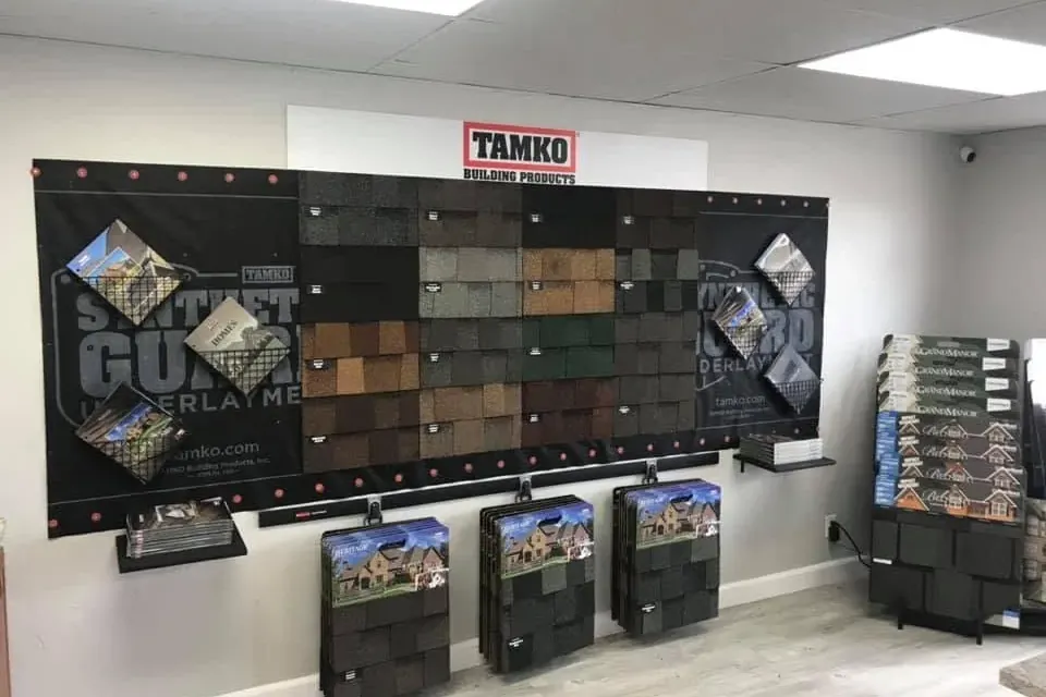 TAMKO shingle display wall in showroom, C&A Roofing & Construction